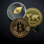 ที่มารูปภาพ : https://www.pexels.com/photo/ripple-etehereum-and-bitcoin-and-micro-sdhc-card-844124/