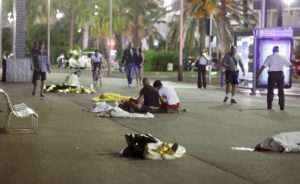 ATTENTION EDITORS - VISUAL COVERAGE OF SCENES OF INJURY OR DEATH - Bodies are seen on the ground July 15, 2016 after at least 30 people were killed in Nice, France, when a truck ran into a crowd celebrating the Bastille Day national holiday July 14.   REUTERS/Eric Gaillard     TPX IMAGES OF THE DAY