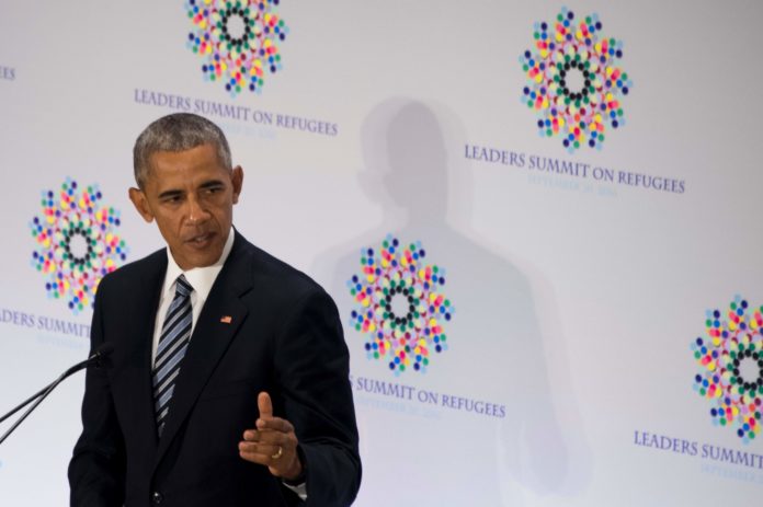 US President Barack Obama delivers remarks during a Refugee Summit on the sidelines of the 71st United Nations General Assembly inNew York on September 20, 2016. / AFP PHOTO / JIM WATSON