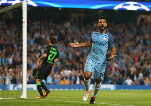 Manchester City's Sergio Aguero celebrates after scoring his sides 3rd goal of the game, and his hat-trick during the Champions League group C soccer match at the Etihad Stadium between Manchester City and Borussia Moenchengladbach in Manchester, England, Wednesday, Sept. 14, 2016. The match was rearranged from Tuesday due to adverse weather conditions in Manchester. (AP Photo/Dave Thompson)