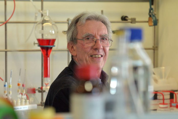 French scientist and Nobel prize winner Jean-Pierre Sauvage poses in his laboratory at the Science and Supramolecular Engineering Institute at the University of Strasbourg in eastern France on October 5, 2016. A trio of French, British and Dutch scientists won the Nobel Chemistry Prize for developing molecular machines, the world's smallest machines that may one day act as artificial muscles to power tiny robots or even prosthetic limbs. Jean-Pierre Sauvage of France, J Fraser Stoddart of Britain and Bernard Feringa of the Netherlands "have developed molecules with controllable movements, which can perform a task when energy is added," the jury said. / AFP PHOTO / PATRICK HERTZOG