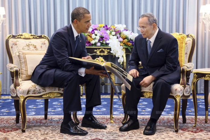 FILE - In this Nov. 18, 2012, file photo released by Thailand's Bureau of the Royal Household, U.S. President Barack Obama, left, talks with Thai King Bhumibol Adulyadej at Siriraj Hospital in Bangkok. Thailand's Royal Palace said on Thursday, Oct. 13, 2016, that Thailand's King Bhumibol Adulyadej, the world's longest-reigning monarch, has died at age 88. (Bureau of the Royal Household via AP, File)