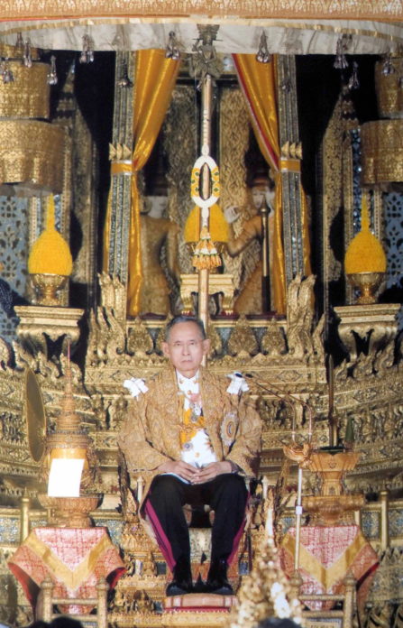This handout picture taken 05 December 2006 shows Thai King Bhumibol Adulyadej sitting during his 79th birthday at the Palace in Bangkok. Thai King Bhumibol Adulyadej's praise for the post-coup government in his annual speech to the nation could help boost its sagging popularity with anti-putsch protests looming, analysts say. RESTRICTED TO EDITORIAL USE AFP PHOTO/ROYAL BUREAU/HO