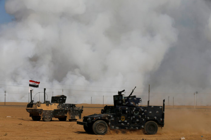 Smoke rises from a sulfur factory REUTERS/Thaier Al-Sudan