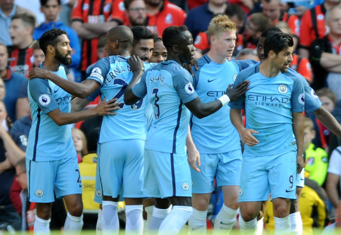 Manchester City's Kevin De Bruyne, third-right, celebrates with teammates after scoring during the English Premier League soccer match between Manchester City and Bournemouth at the Etihad Stadium in Manchester, England, Saturday, Sept. 17, 2016. (AP Photo/Rui Vieira)