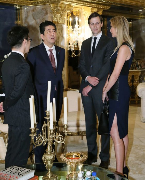 This handout picture, released by Japan's Cabinet Secretariat on November 18, 2016 shows Japanese Prime Minister Shinzo Abe (2nd L) being welcomed by Ivanka Trump (R) and her husband Jared Kushner (2nd R) during a meeting with US President-elect Donald Trump (not pictured) in New York. Abe voiced confidence on November 17 about Trump as he became the first foreign leader to meet the US president-elect, who was narrowing in on cabinet choices. / AFP PHOTO / Cabinet Secretariat / HO / HANDOUT RESTRICTED TO EDITORIAL USE - MANDATORY CREDIT "AFP PHOTO / CABINET SECRETARIAT" - NO MARKETING - NO ADVERTISING CAMPAIGNS - DISTRIBUTED AS A SERVICE TO CLIENTS