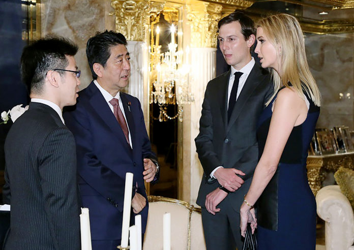 This handout picture, released by Japan's Cabinet Secretariat on November 18, 2016 shows Japanese Prime Minister Shinzo Abe (2nd L) being welcomed by Ivanka Trump (R) and her husband Jared Kushner (2nd R) during a meeting with US President-elect Donald Trump (not pictured) in New York. Abe voiced confidence on November 17 about Trump as he became the first foreign leader to meet the US president-elect, who was narrowing in on cabinet choices. / AFP PHOTO / Cabinet Secretariat / HO / HANDOUT RESTRICTED TO EDITORIAL USE - MANDATORY CREDIT "AFP PHOTO / CABINET SECRETARIAT" - NO MARKETING - NO ADVERTISING CAMPAIGNS - DISTRIBUTED AS A SERVICE TO CLIENTS