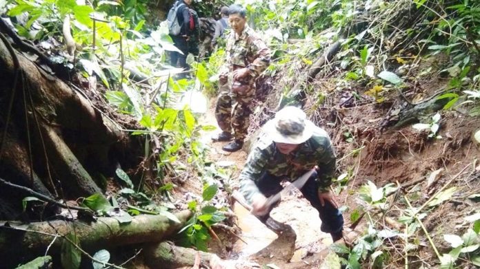 สกัดน้ำจากผาหมี ห้ามไหลเข้าถ้ำหลวง 