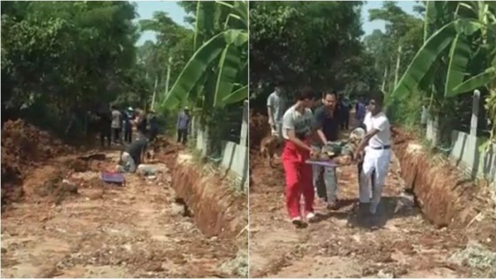กู้ภัยกำลังช่วยเหลือนายอังคาร ที่ถูกดินถล่มทับส่งโรงพยาบาล