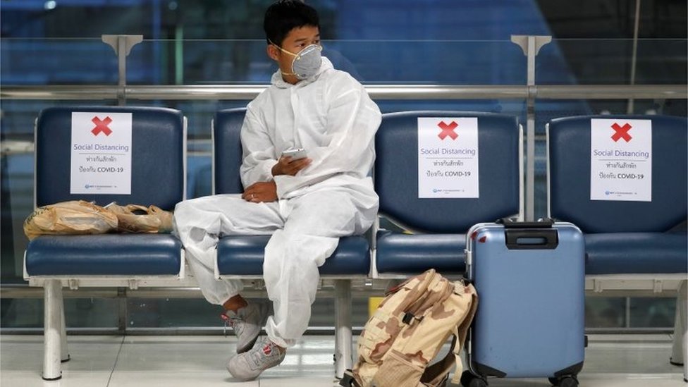 A passenger is seen at Bangkok"s Suvarnabhumi International Airport as Thailand temporarily banned all passenger flights from landing in the country to curb the outbreak of the coronavirus disease (COVID-19)