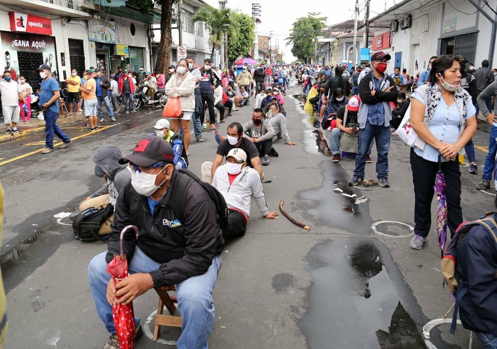 People queue in Peru