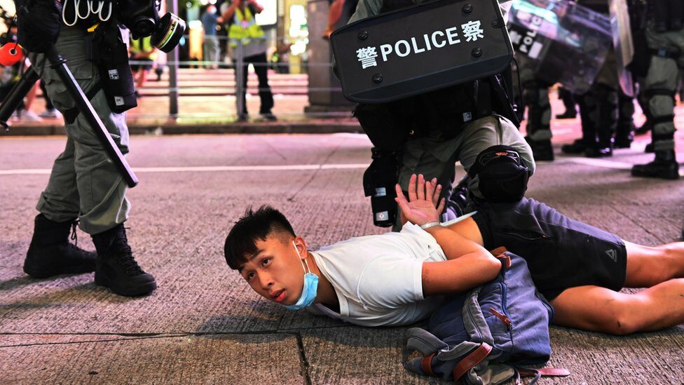 Police officers detain protesters during a rally against a new national security law on the 23rd anniversary of the establishment of the Hong Kong Special Administrative Region in Hong Kong, China, 01 July 2020
