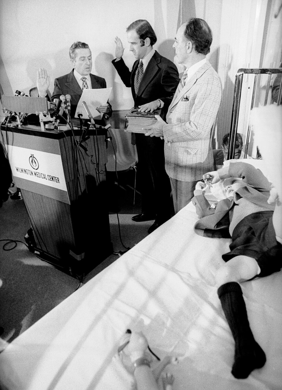 Senator Joseph Biden takes the oath of office in a hospital room