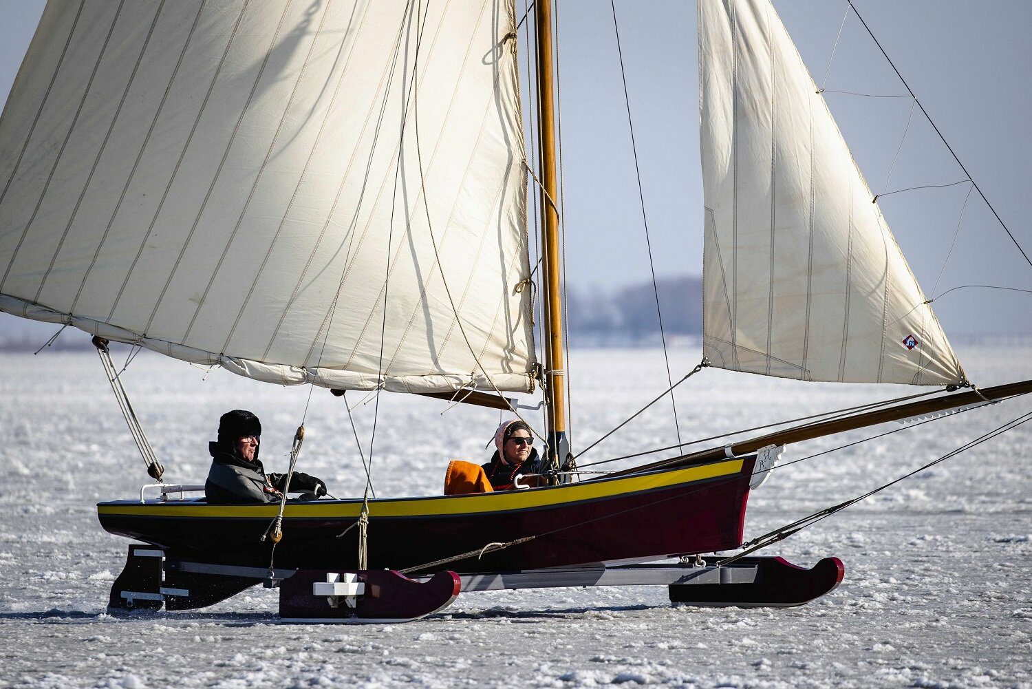 People are ice sailing on the Gouwzee in the Netherlands, 12 February 2021.