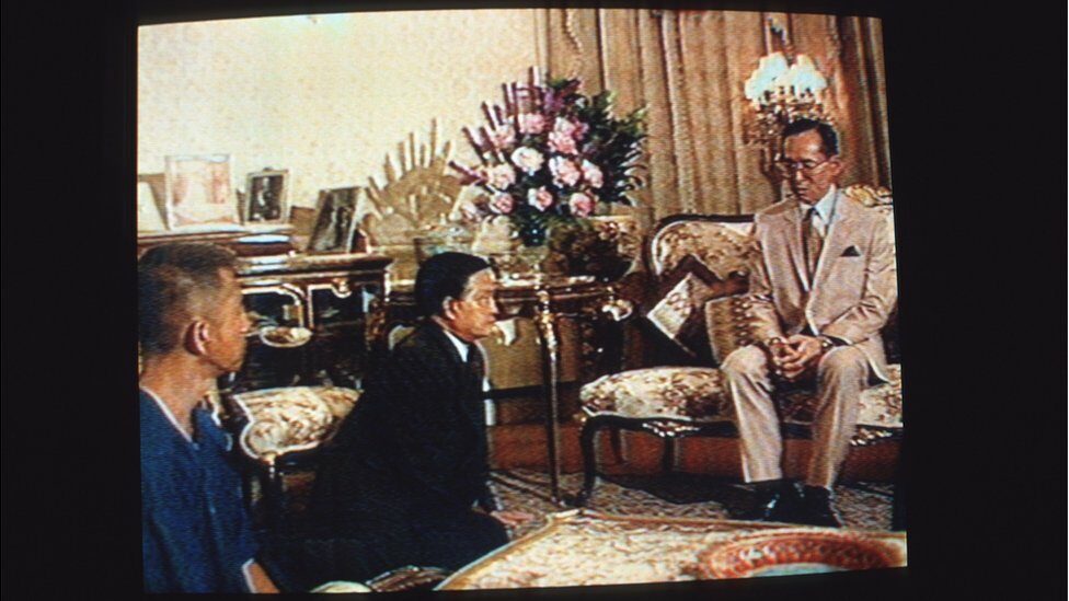 1992/05/20: The King of Thailand, His Majesty King Bhumibol Adulyadej lectures the two protagonists in the recent struggle for democracy in Thailand. Chamlong Srimuang (left), the de facto leader of the street demonstrations, kneels next to General Suchinda Kraprayoon who was one of the leaders of a civilian-government toppling coup in 1991 and was later to proclaim himself Prime Minister thereby sparking the demonstrations and violence that left dozens of civilians dead, shot by the Thai Military. Soon after this meeting Suchinda resigned