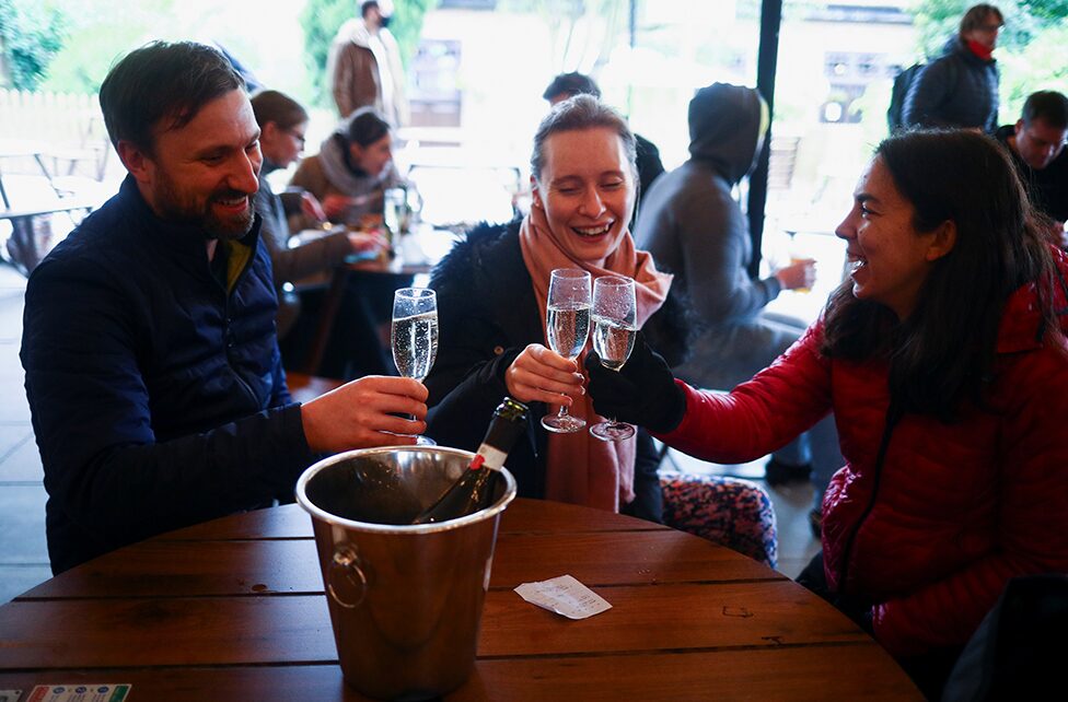 Drinkers at the Fox on the Hill pub in London