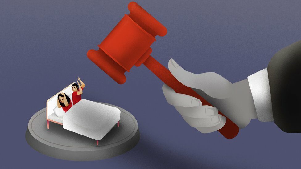 Illustration of couple in bed with a judges gavel coming down on them.