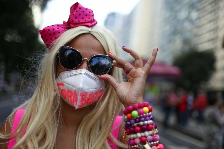 A woman takes part in a protest calling for the impeachment of Brazil"s President Jair Bolsonaro and against his handling of the coronavirus disease (COVID-19) pandemic, in Rio de Janeiro, Brazil, July 3, 2021