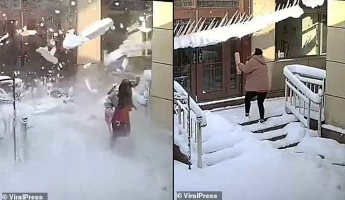 ระทึกแผ่นหิมะร่วงใส่สาว