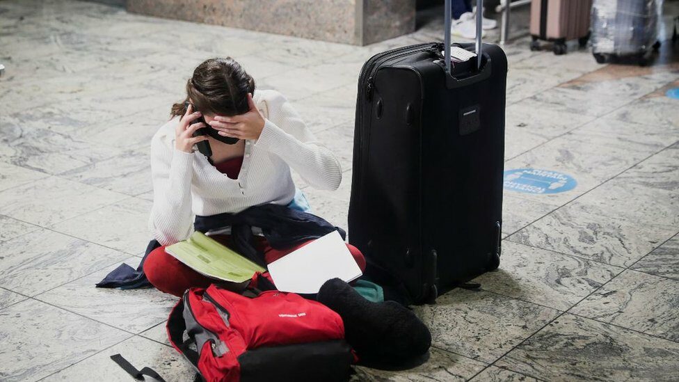 Woman on phone at OR Tambo international airport