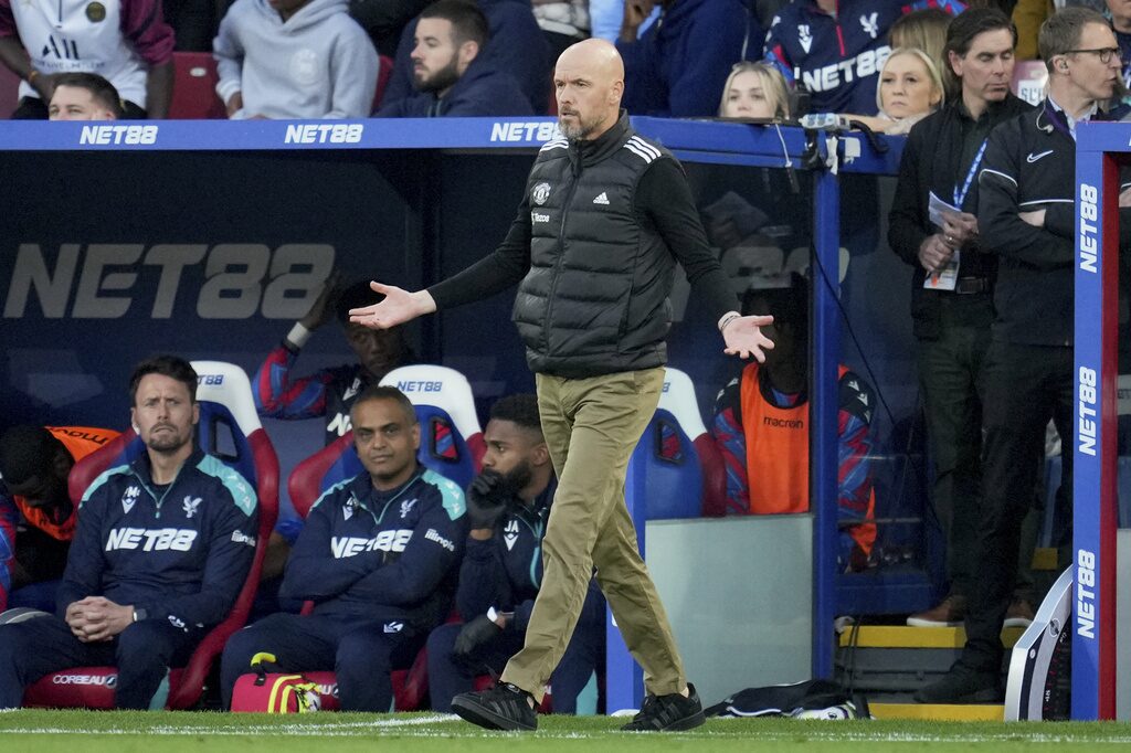 Manchester United head coach⁢ Erik ten Hag poses