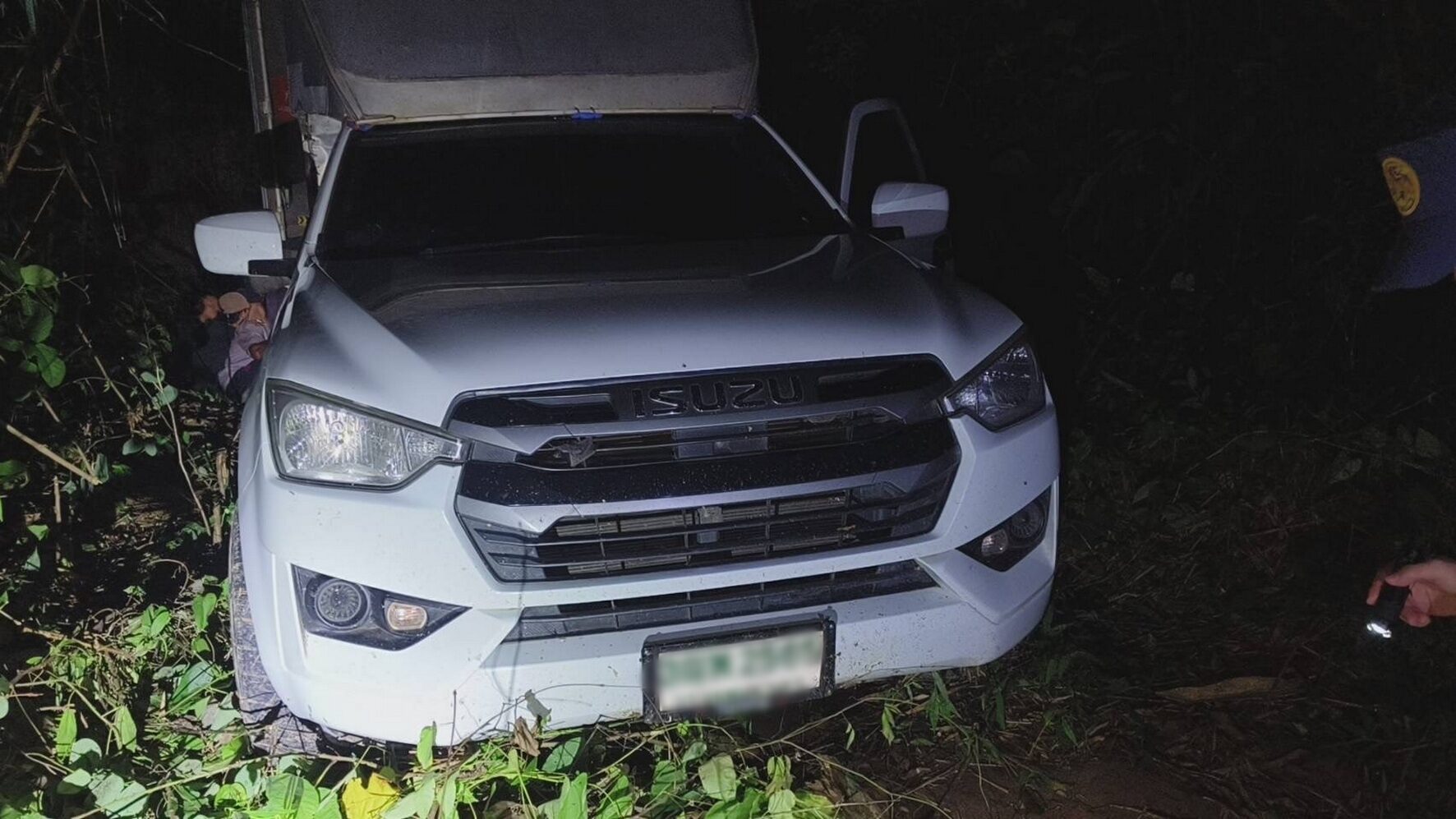 Thai police thwart migrant smuggling after truck stuck in mud | News by Thaiger