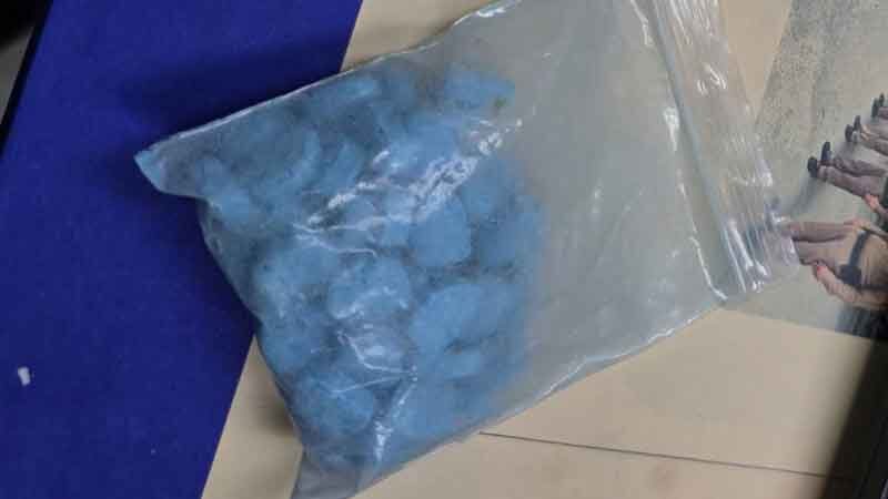 Bangkok delivery rider caught with Trump-themed ecstasy pills | News by Thaiger