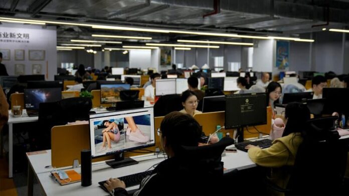 Office workers in China. Under the country’s labour laws, employees are entitled to sanitation protection.