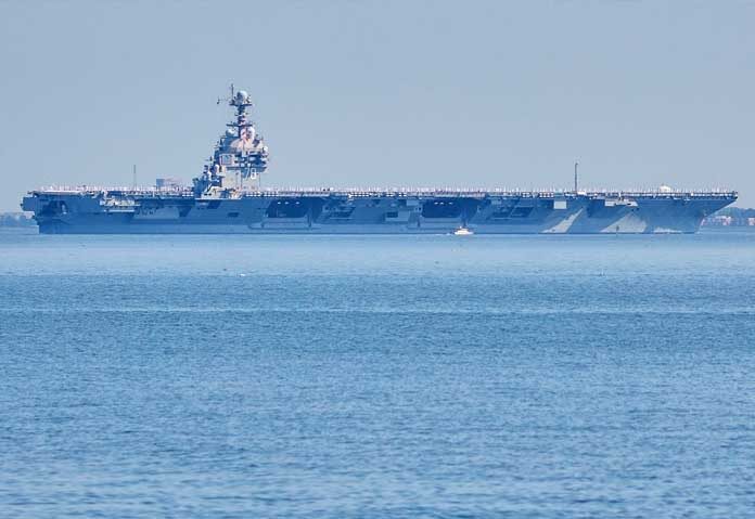 ทรัมป์แนะอิหร่าน - ภาพถ่ายจากแฟ้มภาพ: เรือบรรทุกเครื่องบิน USS Gerald R. Ford ออกจากฐานทัพเรือนอร์ฟอล์ก เมื่อวันที่ 23 มิถุนายน 2025 ในเมืองนอร์ฟอล์ก รัฐเวอร์จิเนีย