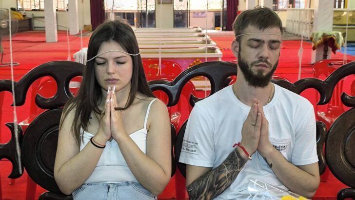 From Russia with Faith: Tourists Participate in Unique Temple Coffin Ritual