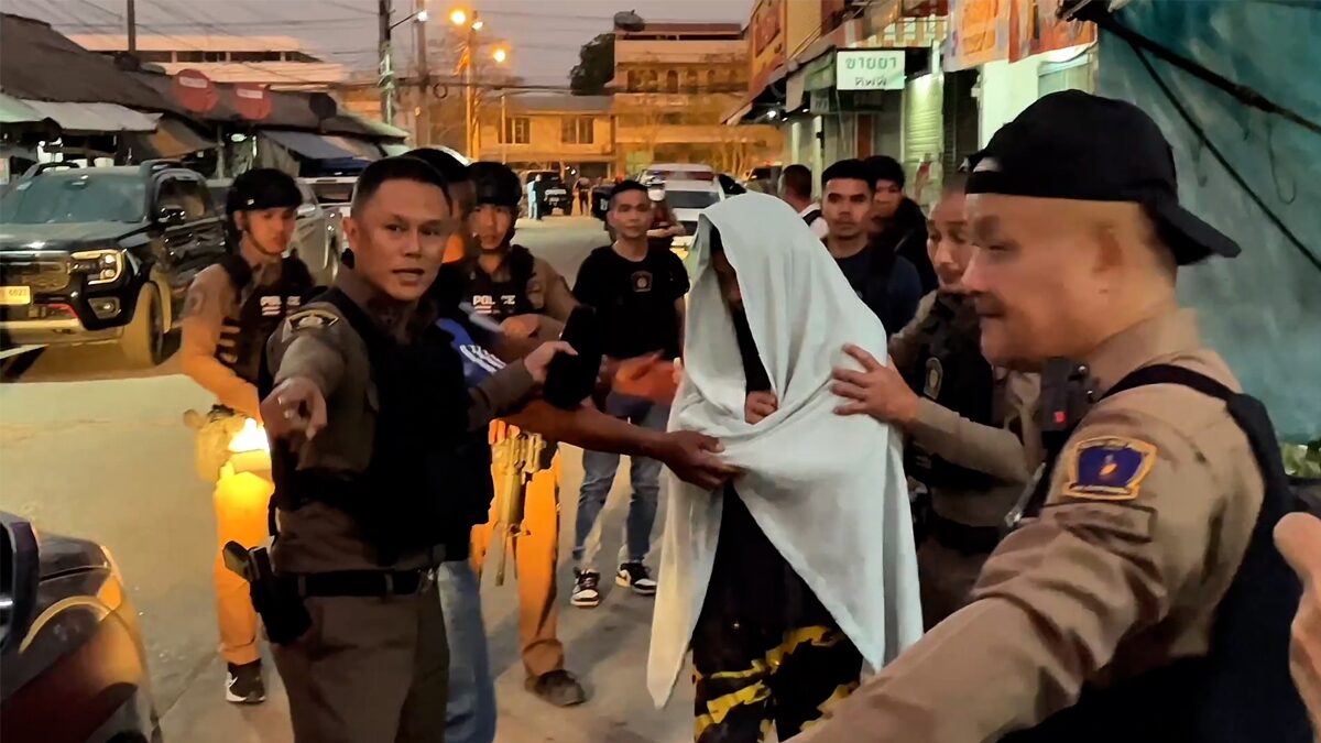 Police Surround and Capture Drug Suspect Hiding in House, Two Officers Injured During Shootout