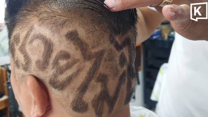 Barber shaves “too rich to handle” slogan into hair, sparking buzz