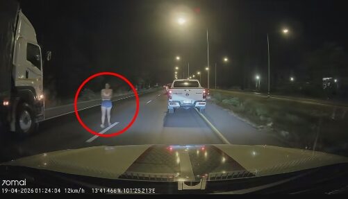 Woman gets out of car, walks into highway during argument