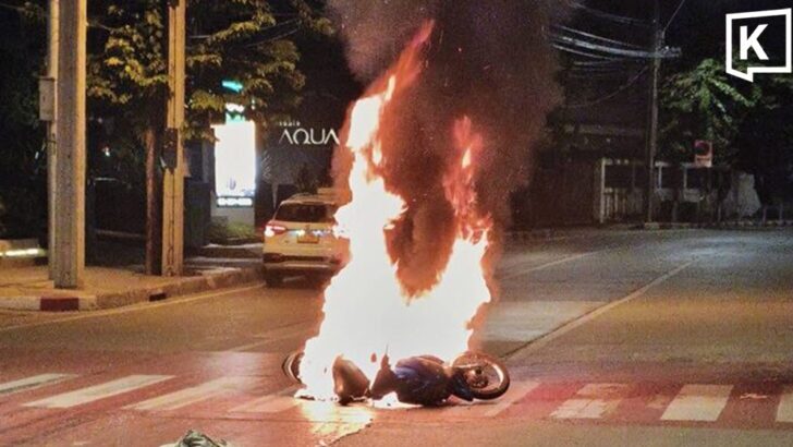 Motorcycle bursts into flames after crash in Bangkok