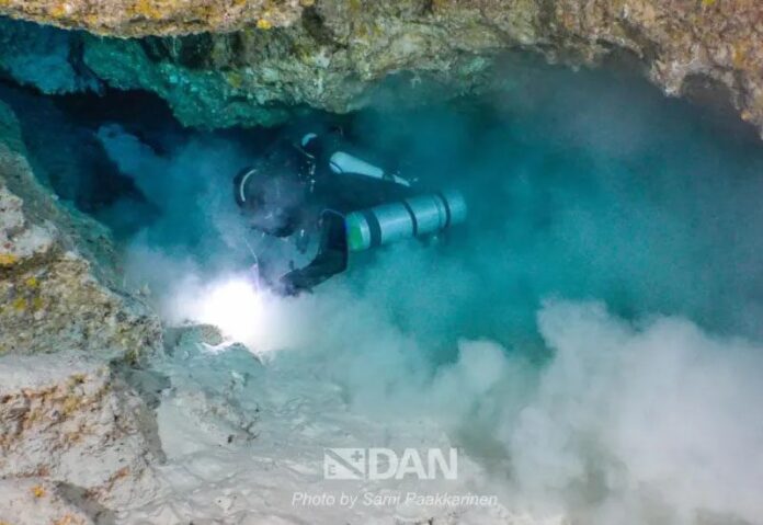 Here a small kick of the fins as one tries to move inside the tight space is enough to stir up sediment from the ocean floor.DAN Europe