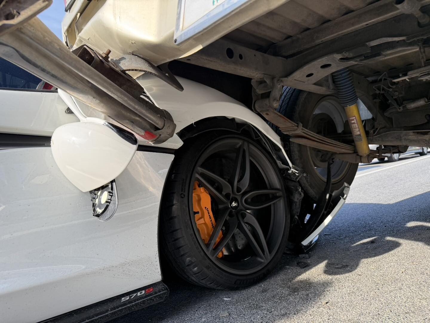 McLaren 570S wedged under pickup truck in Sai Mai crash | News by Thaiger