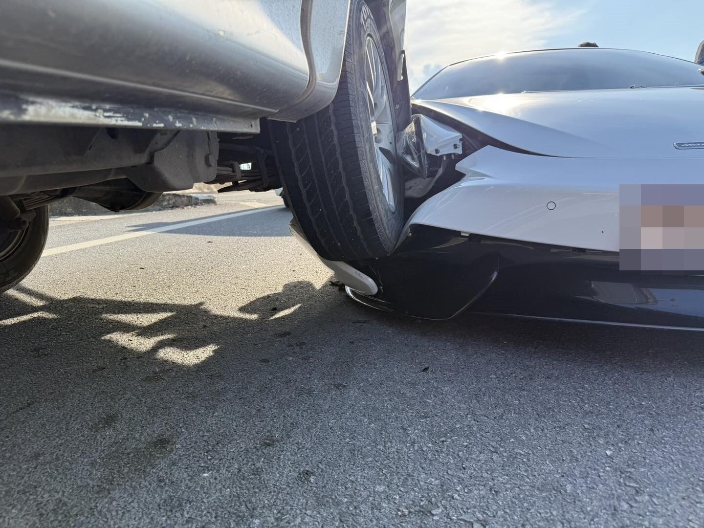 McLaren 570S wedged under pickup truck in Sai Mai crash | News by Thaiger