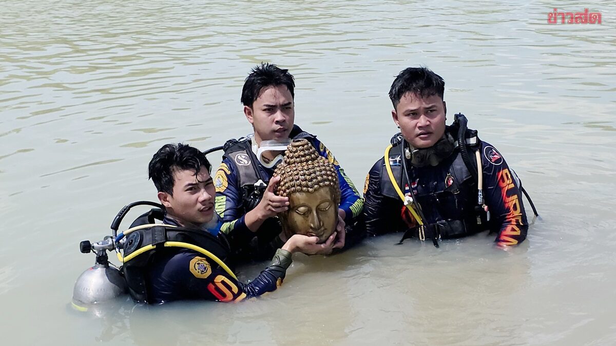 Man Searching for Clams Discovers Decapitated Buddha Head Underwater