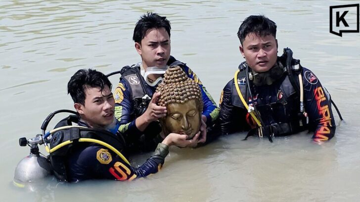 Shellfish diver finds Buddha head mistaken for durian