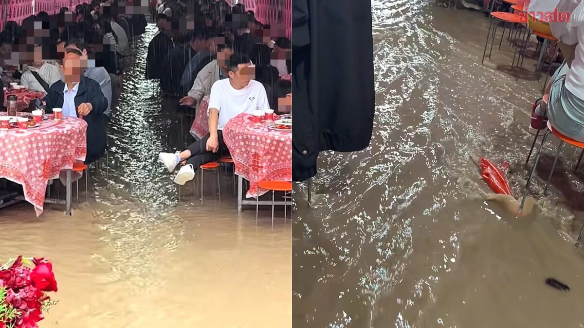 ไวรัล วิวาห์ท้าฝน น้ำท่วมงาน แต่บ่าวสาว-แขกยังใจสู้ นั่งกินเลี้ยงสุดชิล